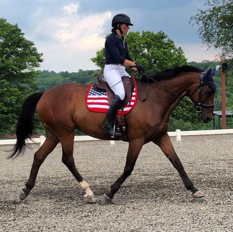 A U.S. Flag Dressage Saddle Pad With a Horse and Rider