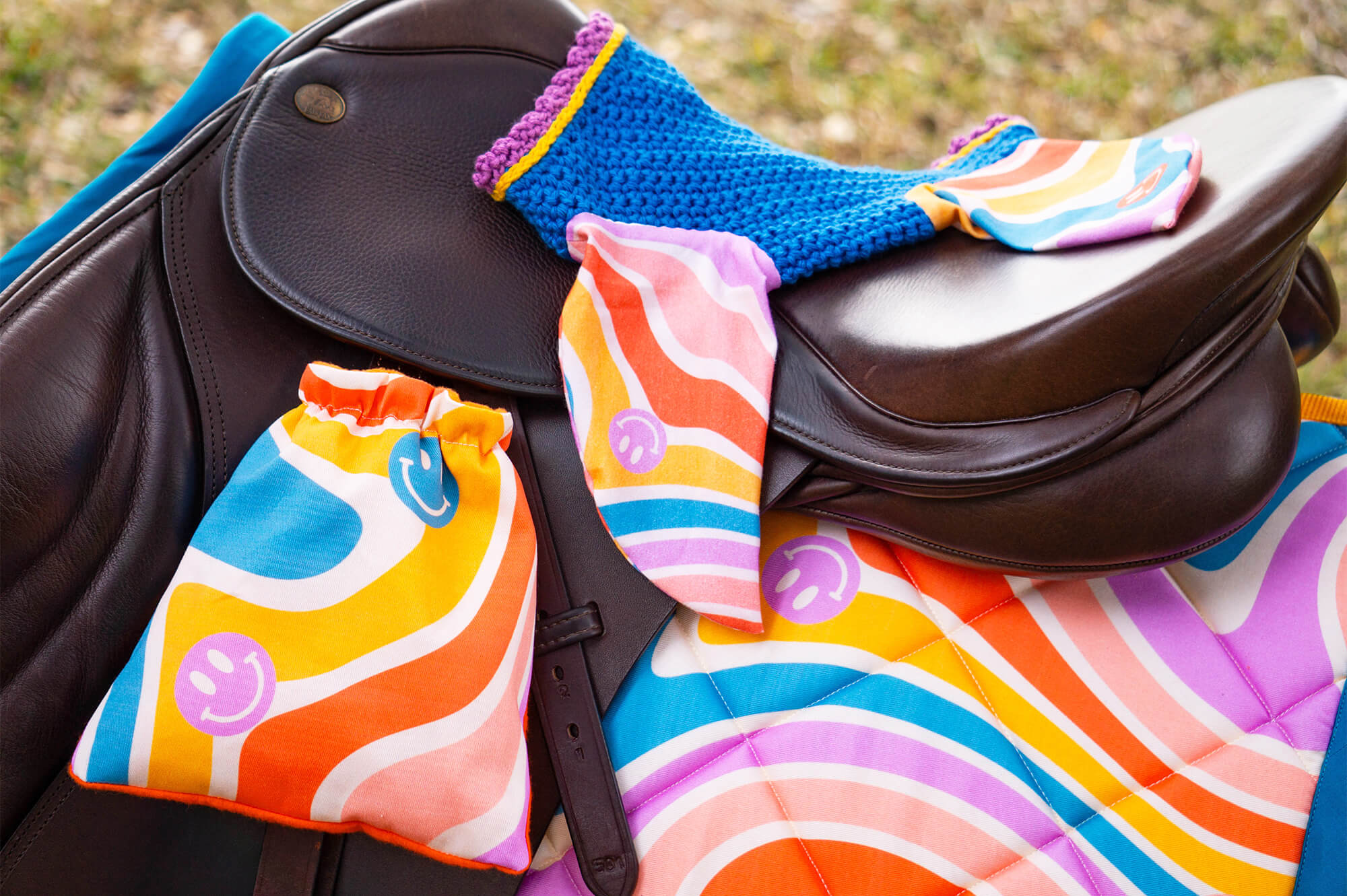 Psychedelic Swirls Groovy Smiles Print Saddle Pad, Fly Bonnet, and Stirrup Covers