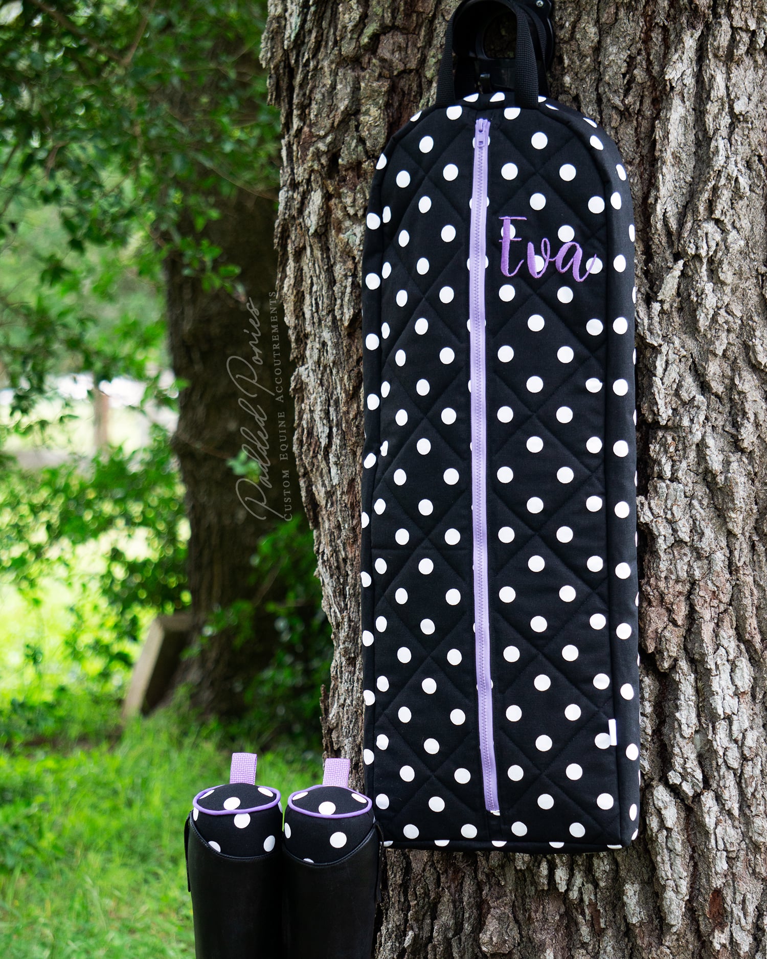 Black polka dots bridle bag with light purple zipper and embroidery 