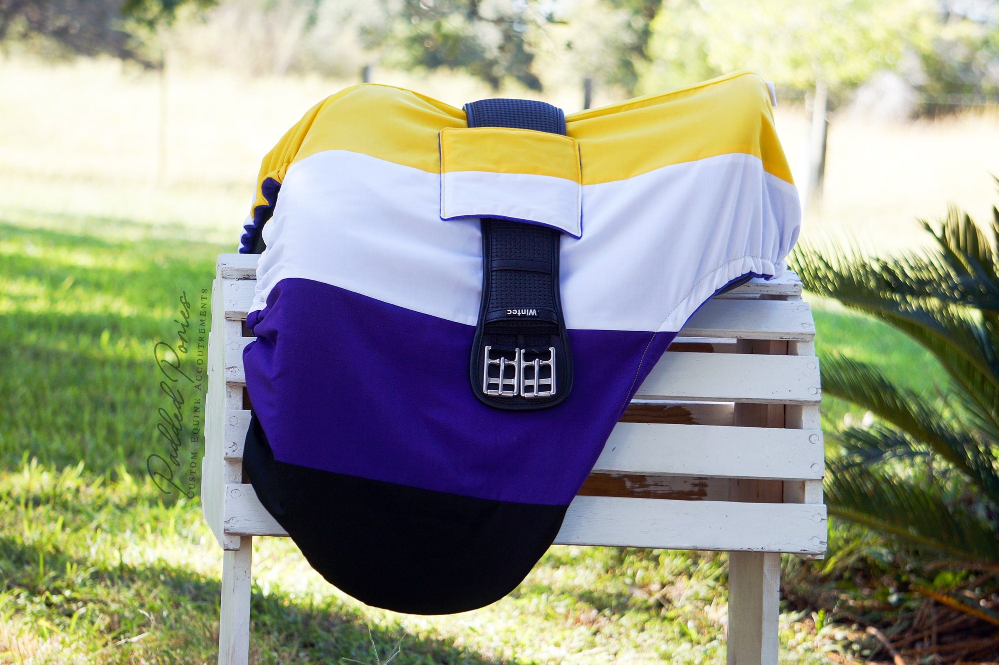 Non-binary flag dressage saddle cover with girth pocket
