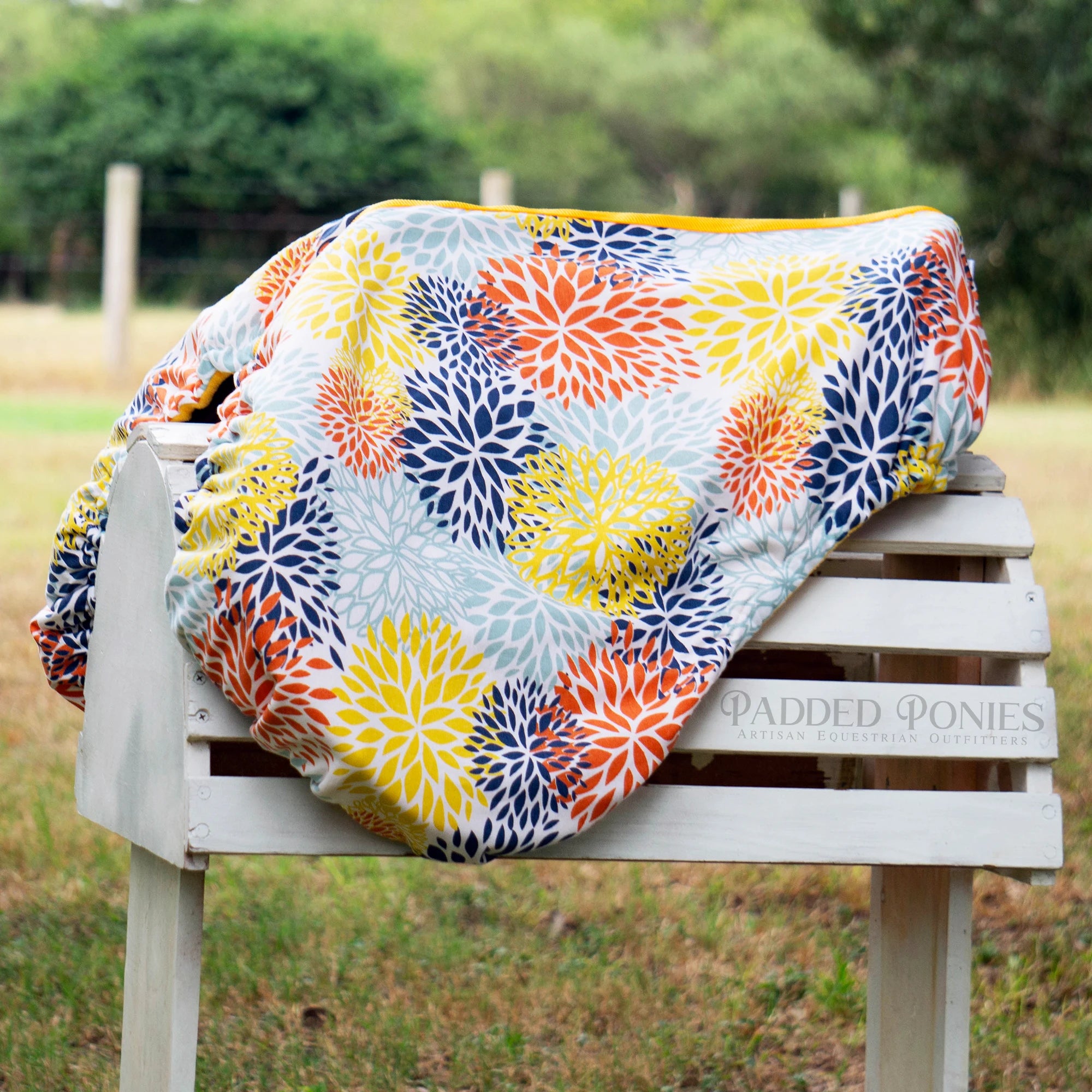 Orange, Yellow, and Blue Floral Blooms All Purpose Saddle Cover
