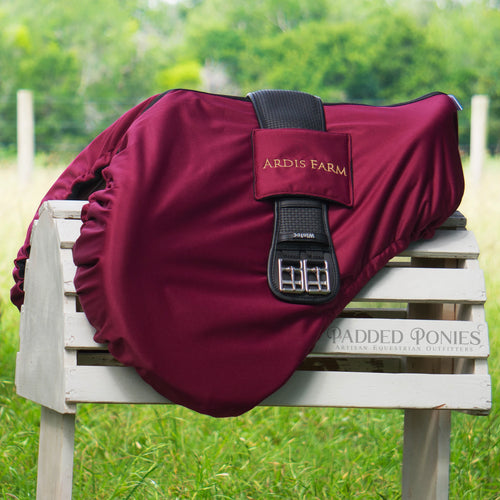 Burgundy, Black, and Gold All Purpose Waterproof Saddle Cover with Girth Holder Pocket and Embroidery